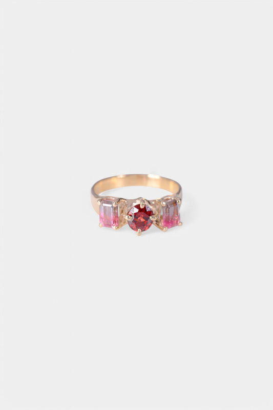 Rosey Ring
solid 9 karat yellow gold with all natural stones: oval cut garnet, two emerald cut watermelon tourmalines.
