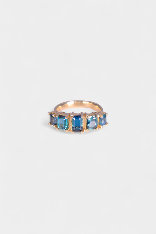 Garage Ring
solid 9 karat yellow gold with all natural stones: tourmalines, blue sapphires. This ring is a size Q or US 8. 